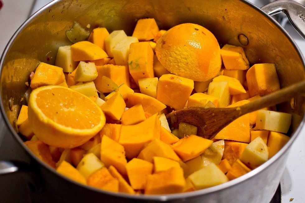 Add the oranges(halved), squash and potatoes and heat them up.