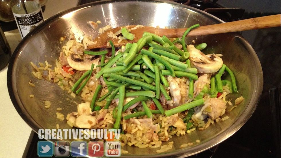 Add the oriental string beans and continue to stir fry. I do not like my string beans over-cooked so that's why I added them last.
