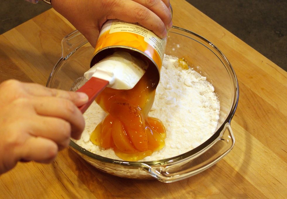 Add the other can of peach pie filling and spread out.