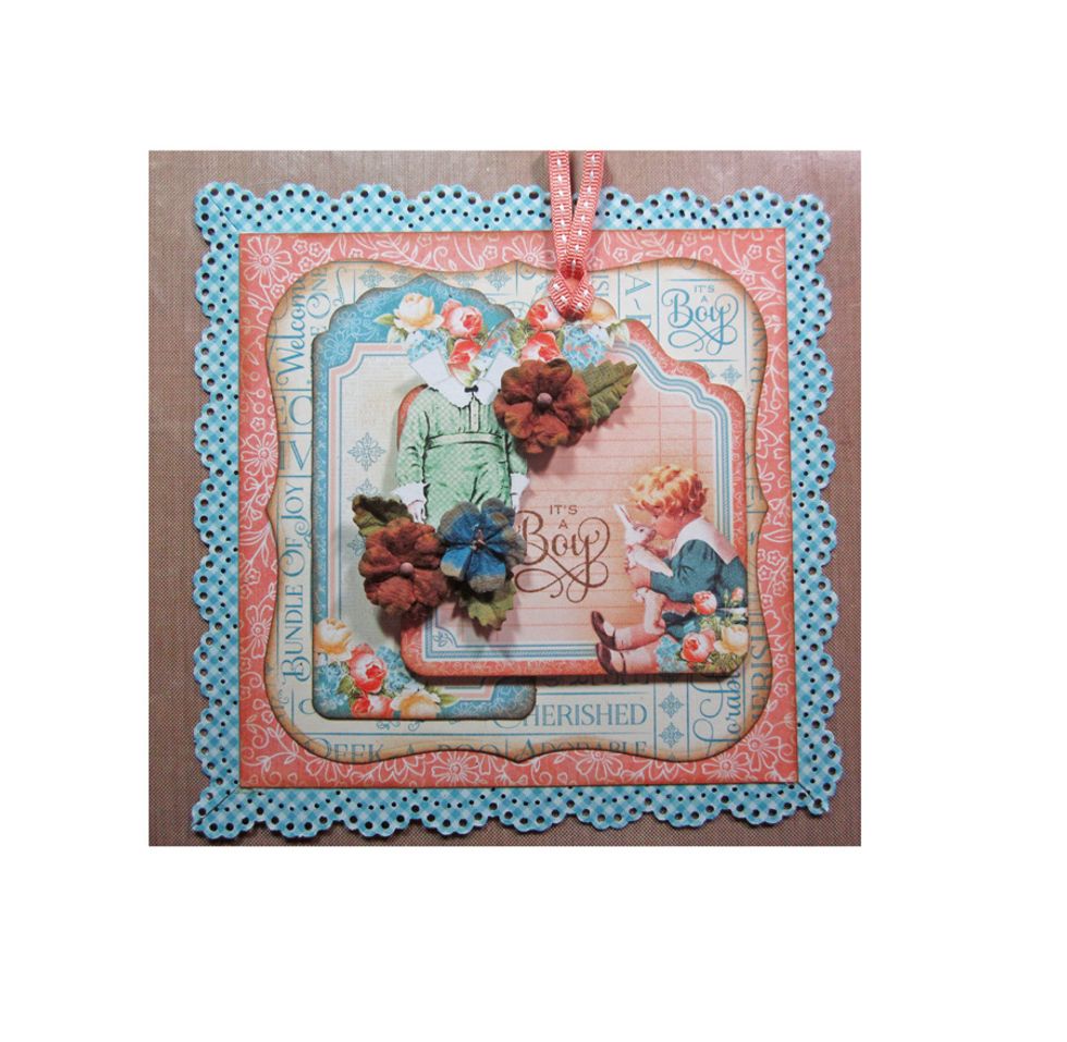 Add the outfit to the front of the card with a foam square and then cluster some Petaloo flowers around the outfit and glue down.