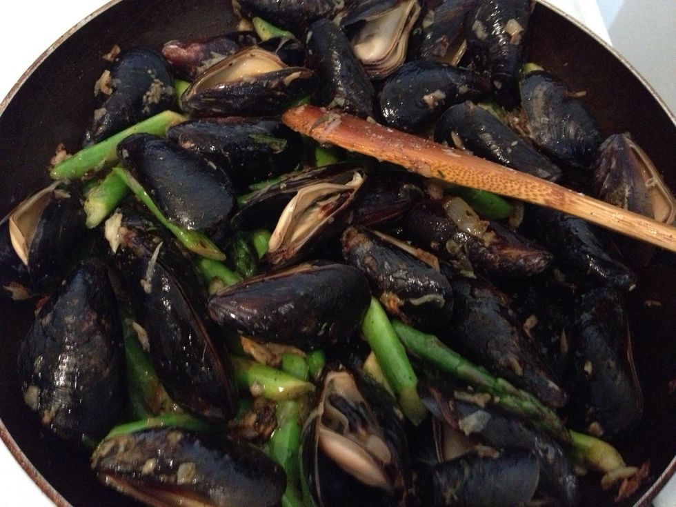 Add the oven cooked mussels to this pot of magical stuff being cooked