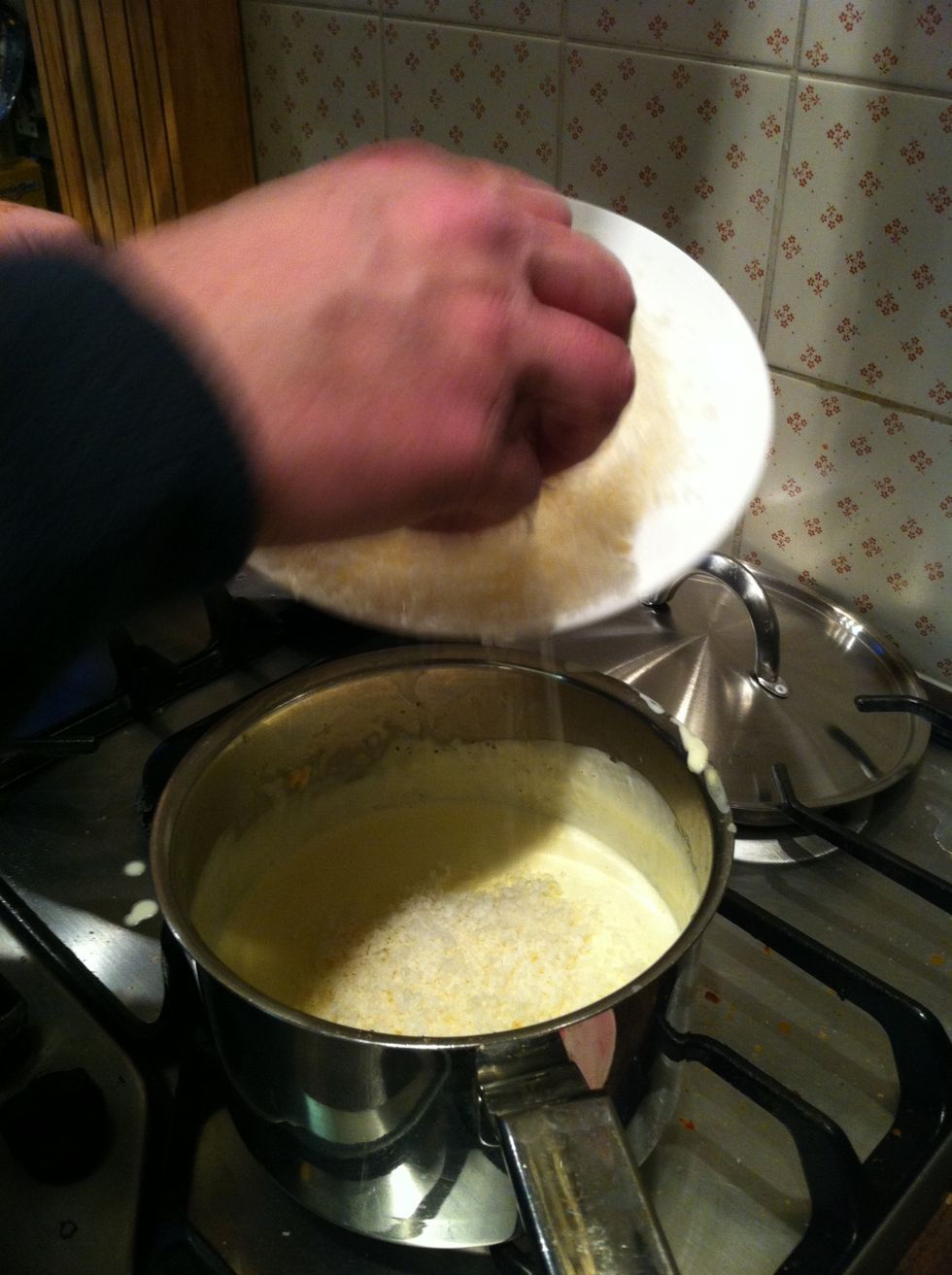 Add the parmesan to the cream and salmon and mix in, heat until the cheese melts and it becomes thick and it's done!