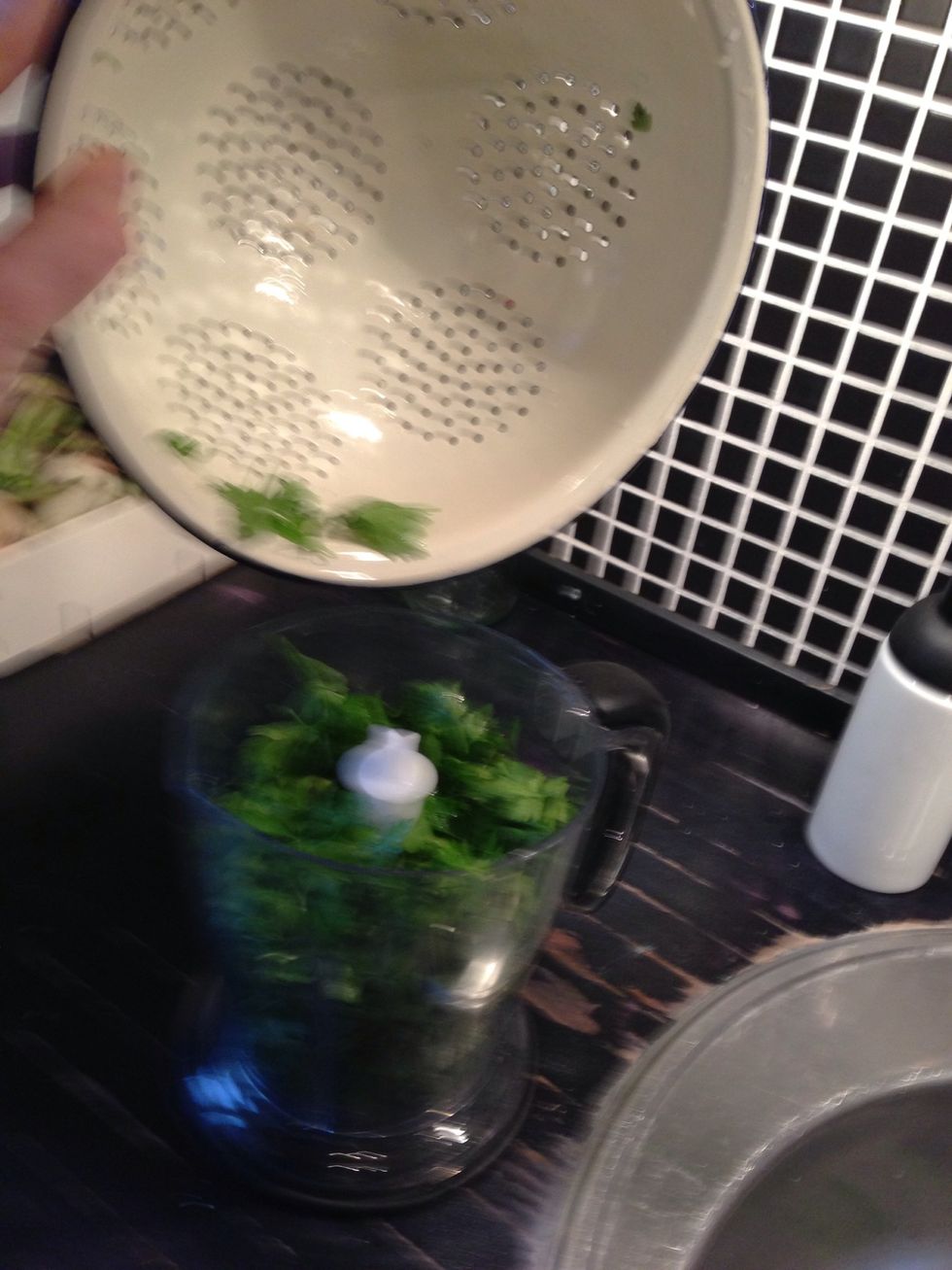 Add the parsley to a blender (or similar)