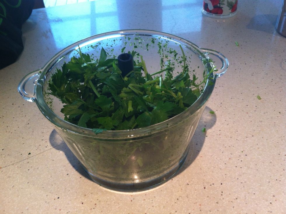 Add the parsley to your food processor. If you have time, the results tend to be better if you hand dice your ingredients.. But I'm short on time today.