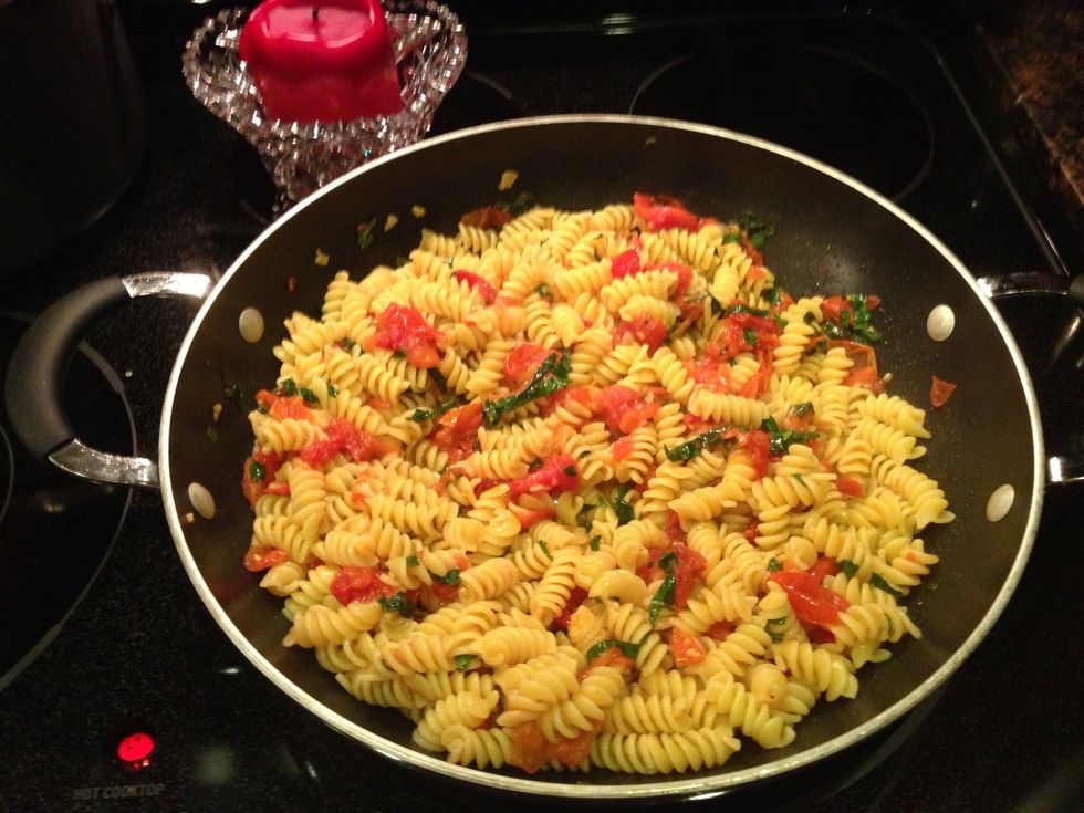 Add the pasta. If it seems like there is not enough liquid, add a bit of the pasta water.