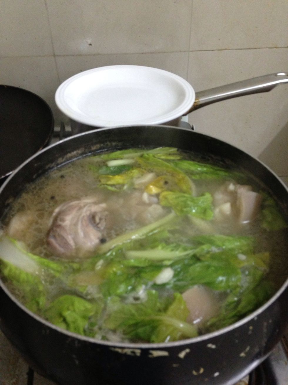 Add the pechay. Bring to boil once.