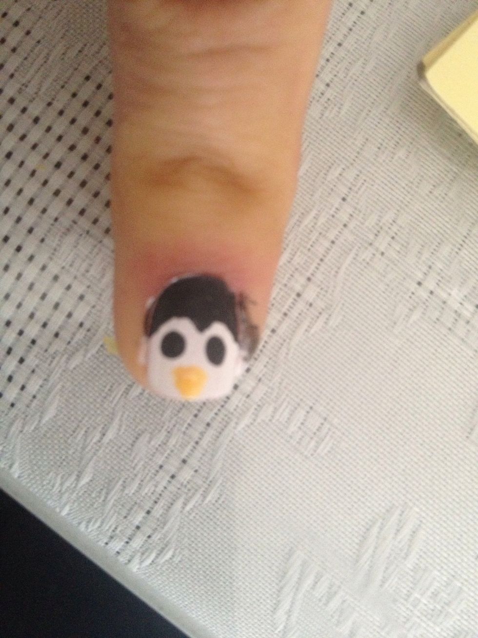 Add the penguin's with the yellow nail polish