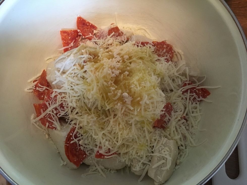 Add the pepperoni and all the other ingredients to the mixing bowl.