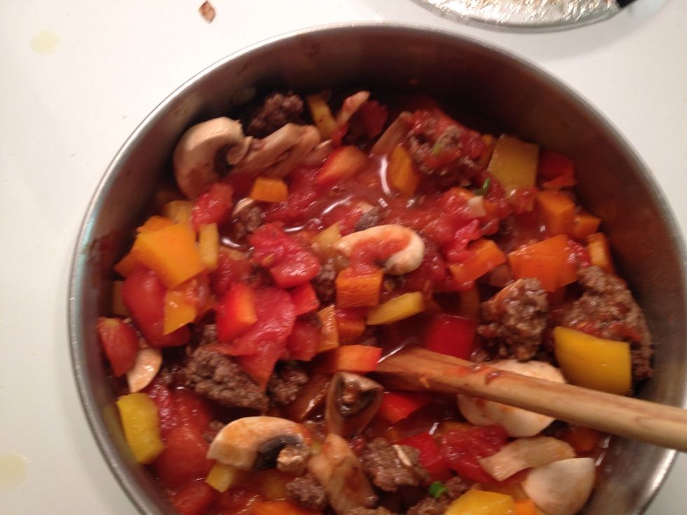Add the peppers and mushrooms. Stir in be careful HOT
