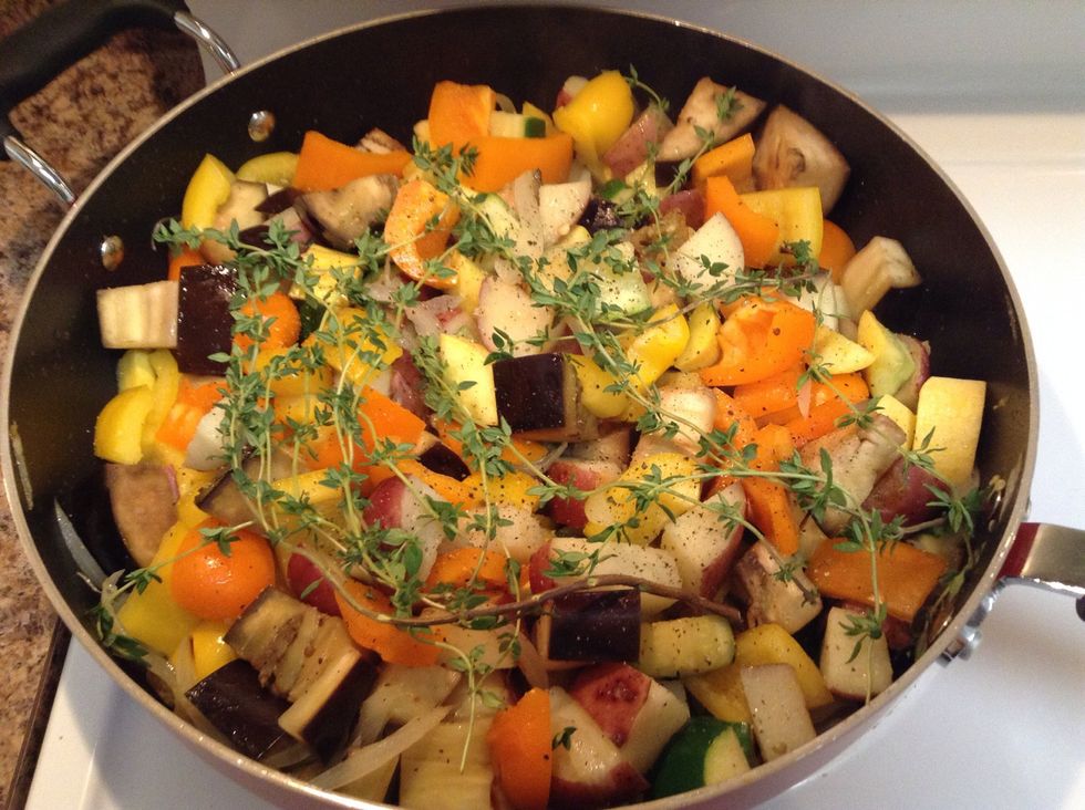 Add the peppers, mix well. Add the thyme and season with salt and pepper to your taste before covering for another 15 min...