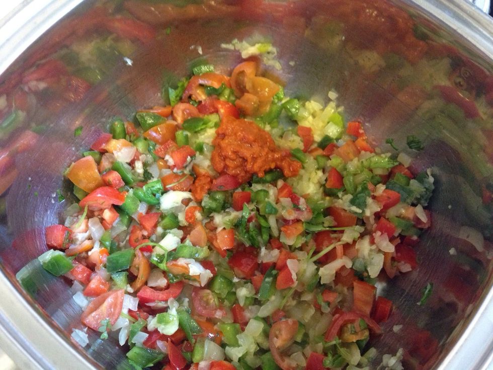 Add the peppers Tomatoes And parsley cook for Five minutes