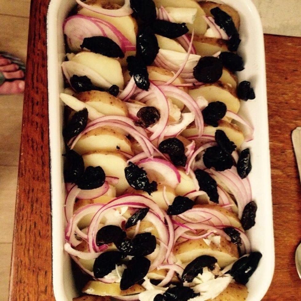 Add the pitted olives on top