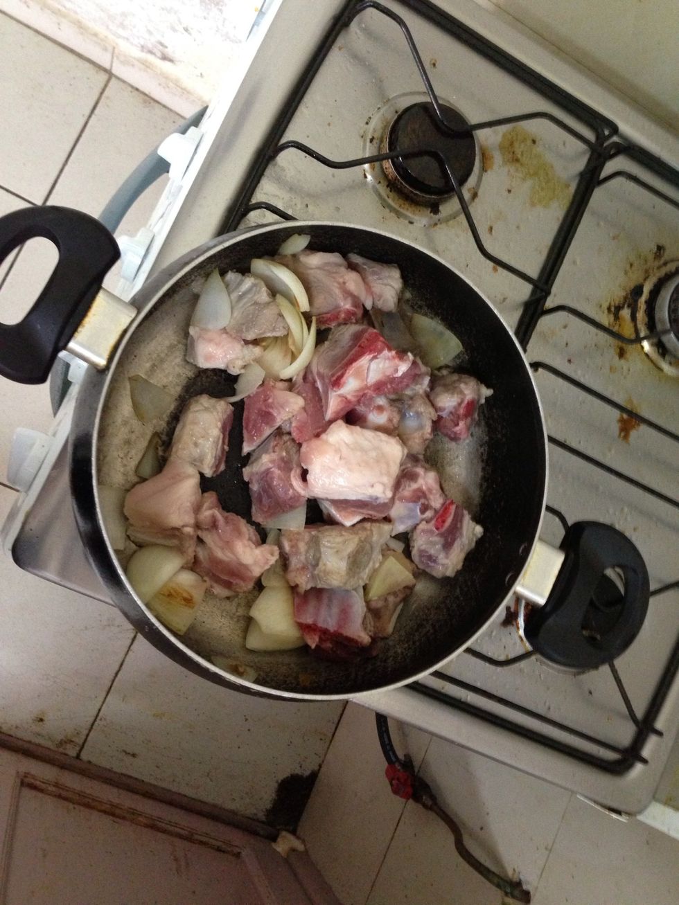 Add the pork. Stir until it becomes brownish. Add fish sauce.