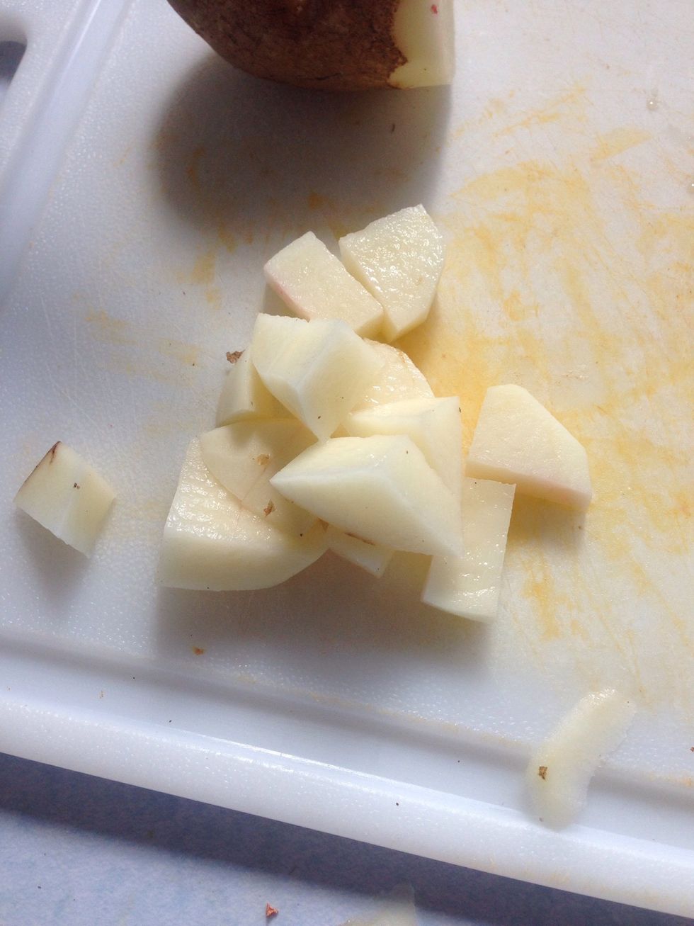 Add the potato to the pot after 5 minutes of simmering, simmer for another 10 minutes.