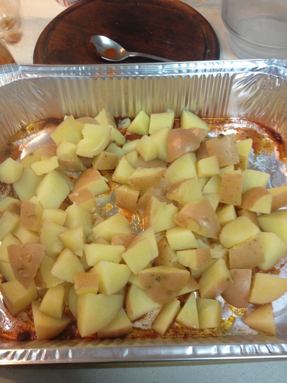 Add the potatoes to the tray