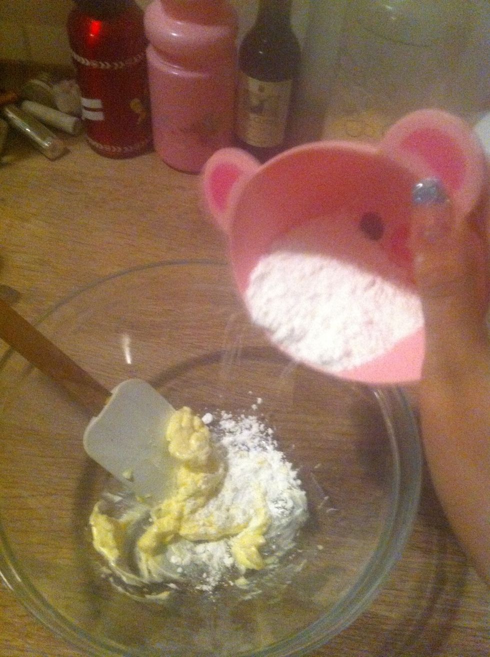 Add the powdered sugar ( 1/3 at the time) and mix well
