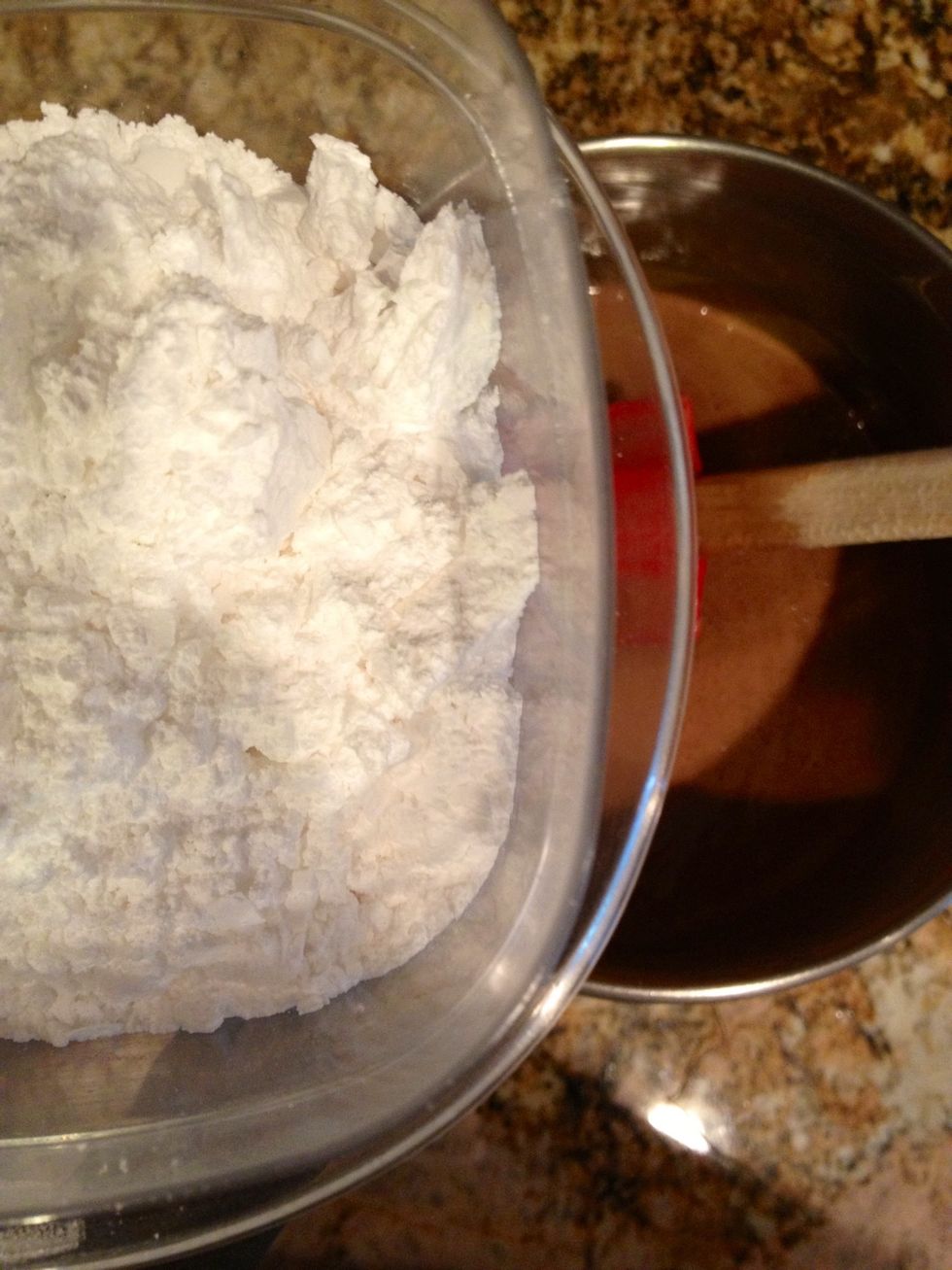 Add the powdered sugar 1/4 cup at a time.