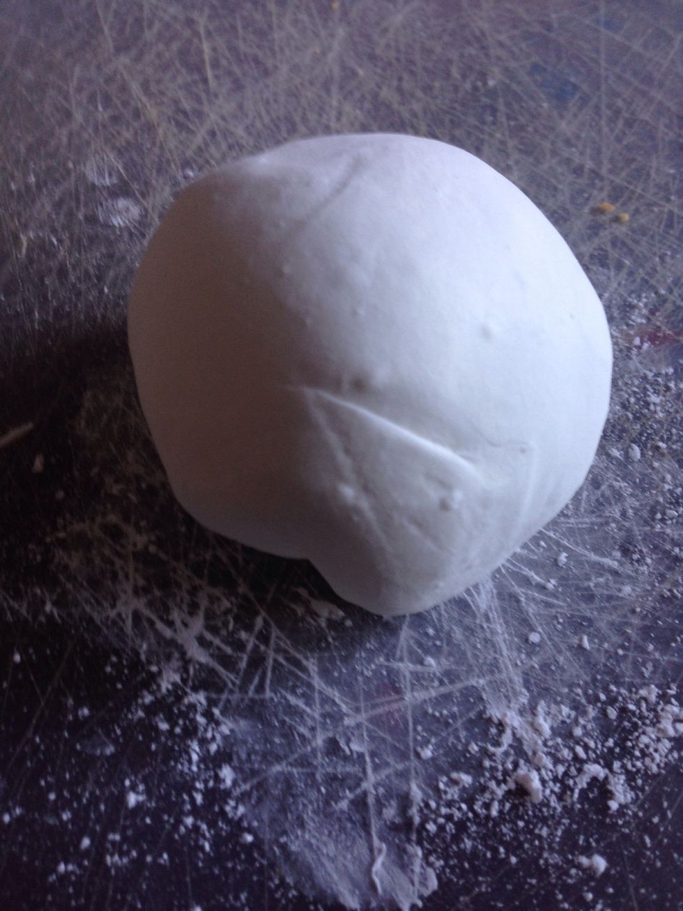 Add the powdered sugar and knead to a dough