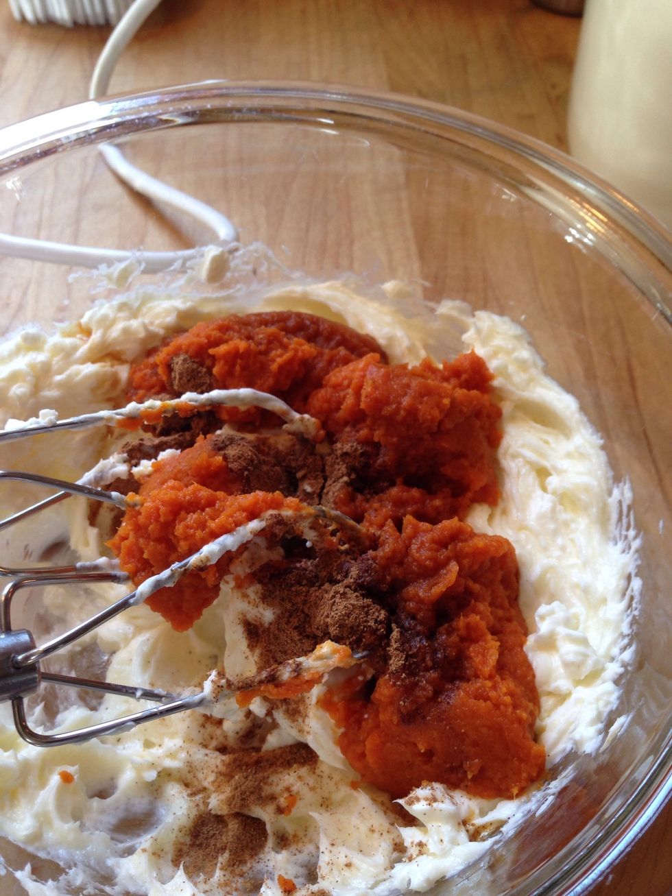 Add the pumpkin, pumpkin pie spice, and vanilla. Beat on low to medium speed till smooth.