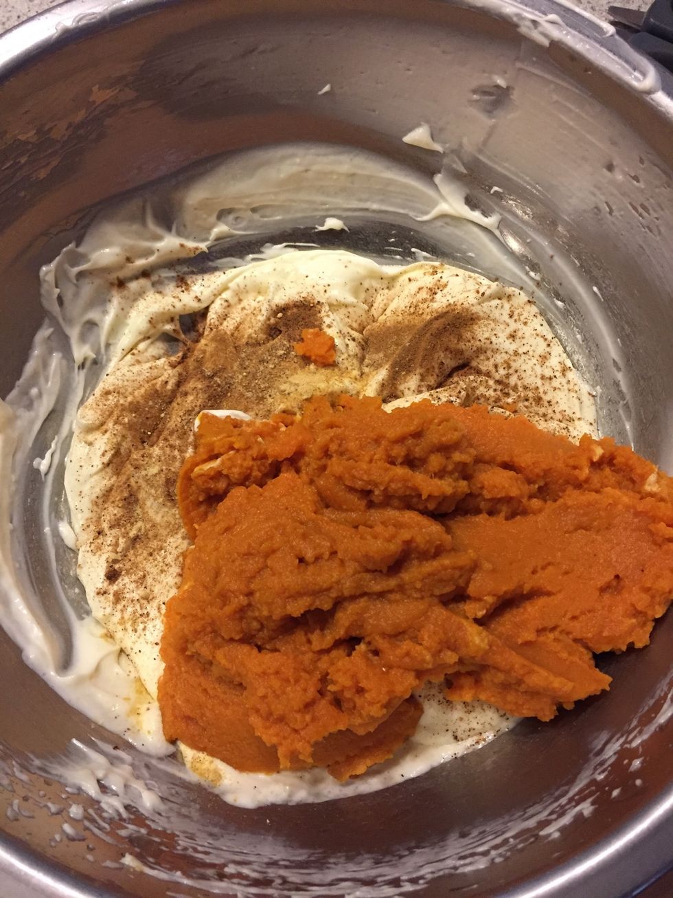 Add the pumpkin pur\u00e9e and all the other spices and mix.