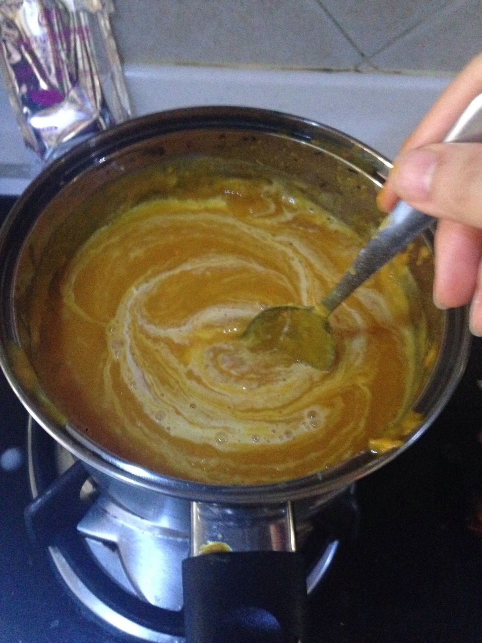 Add the pumpkin pur\u00e9e and turn the heat to low-medium. Add the rice mixture spoon by spoon and keep stirring. Add water or more rice mixture to your desired consistency.