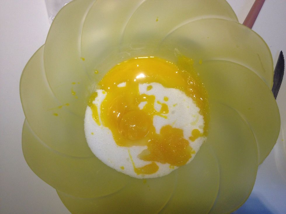 Add the red of the egg to the sugar