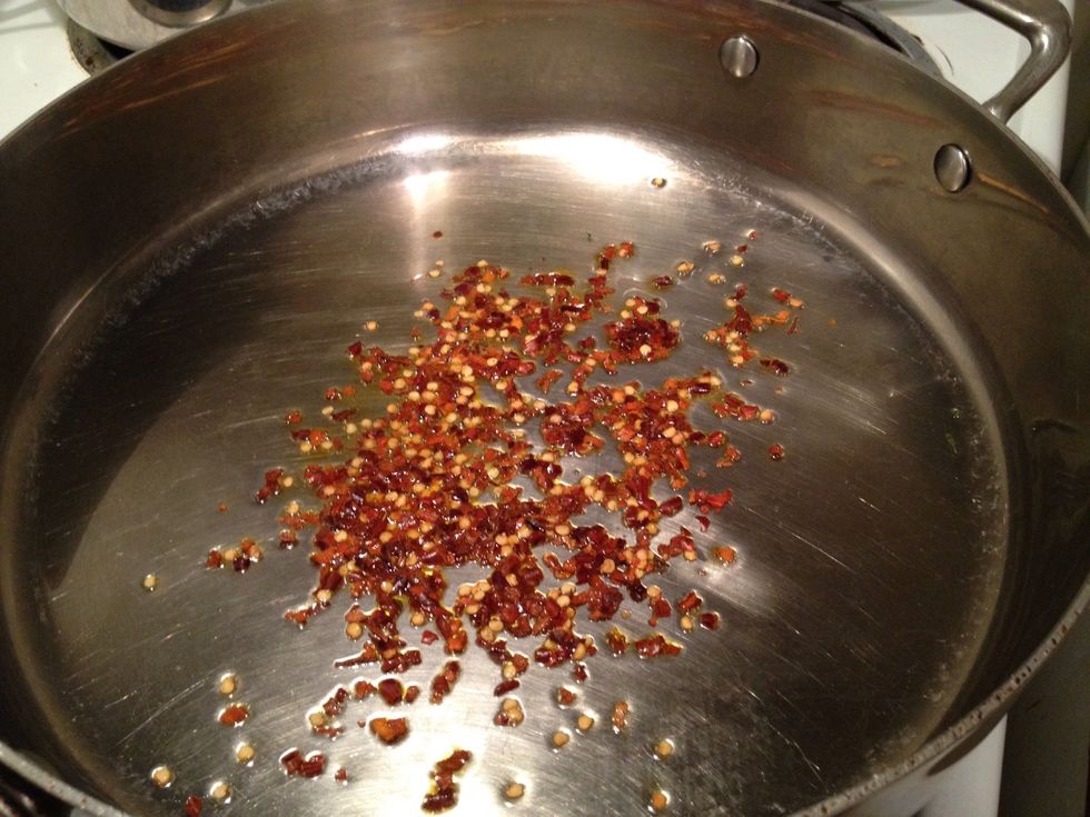 Add the red pepper flakes.  Hehe... Obviously I like it spicy. But suit it to your taste of course. This is about 3 tbsp.