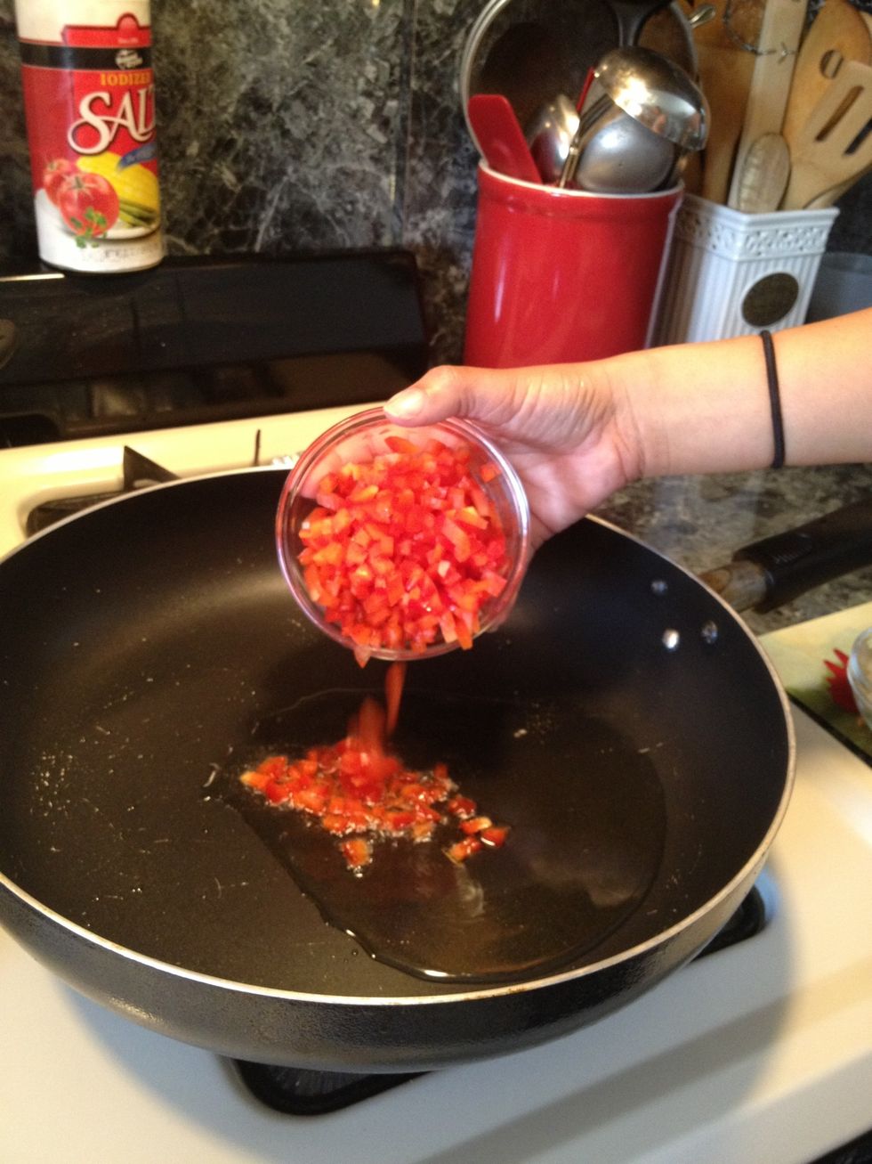 Add the red peppers.