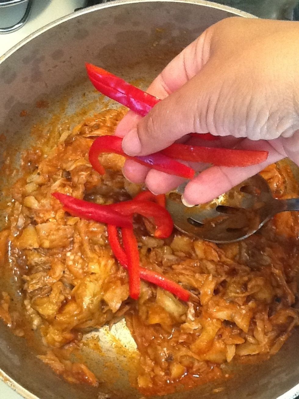 Add the red peppers.