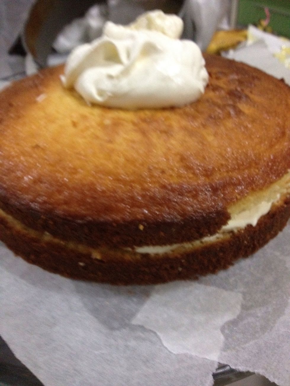 Add the remaining 1/3 of marshmallow creme and cover the cake. This is going to be the crumb coat. This step is very important so dont skip it!