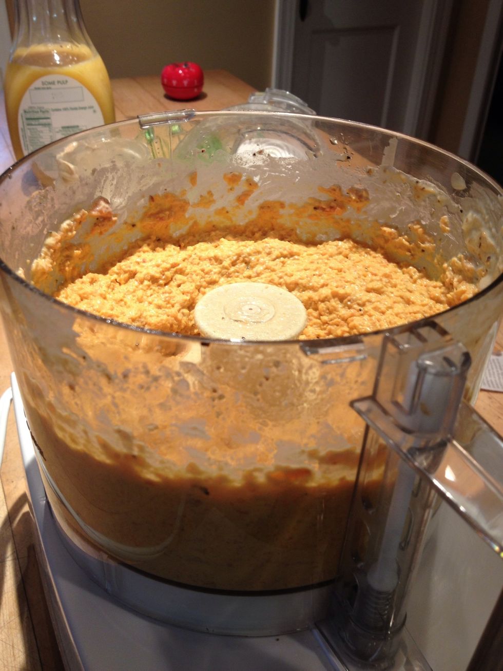 Add the remaining 2T oil and process until smooth. Adjust seasoning as needed.