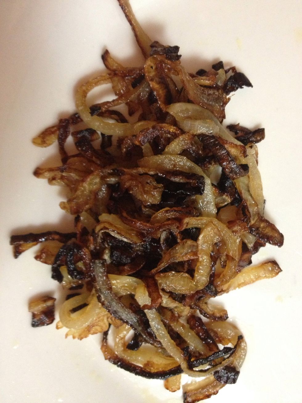 Add the remaining fried onions to the top of the lentil plates