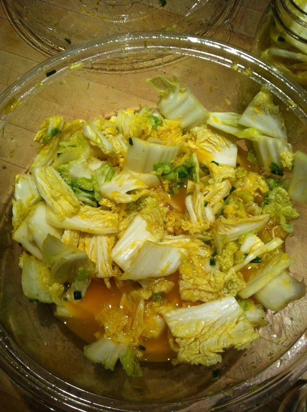 Add the remaining mixture to the blender and pulse several times to combine, then pour the blend over the drained cabbage. Add the fish sauce or additional salt, and your preferred hot sauce.