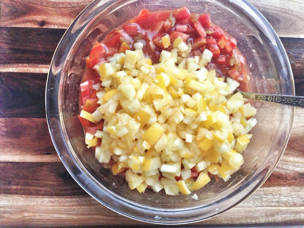 Add the remaining tomatoes and stir.