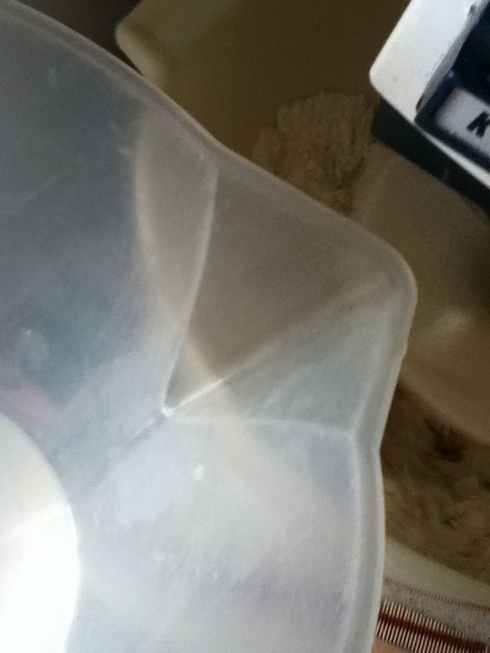 Add the remaining warm water while the mixer is running and let it do it's job for about ten mins