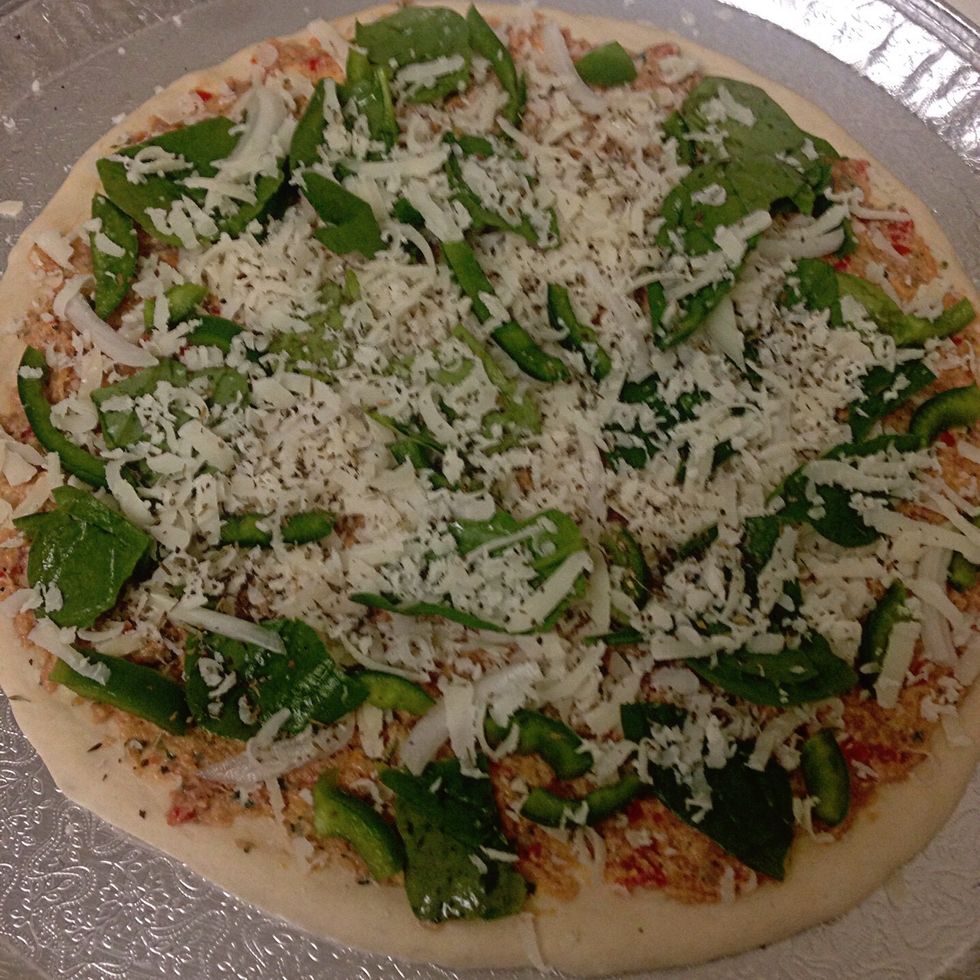 Add the rest of the cheese, and sprinkle it with Italian seasoning. Preheat oven on 450 and cook for about 30-35 minutes.