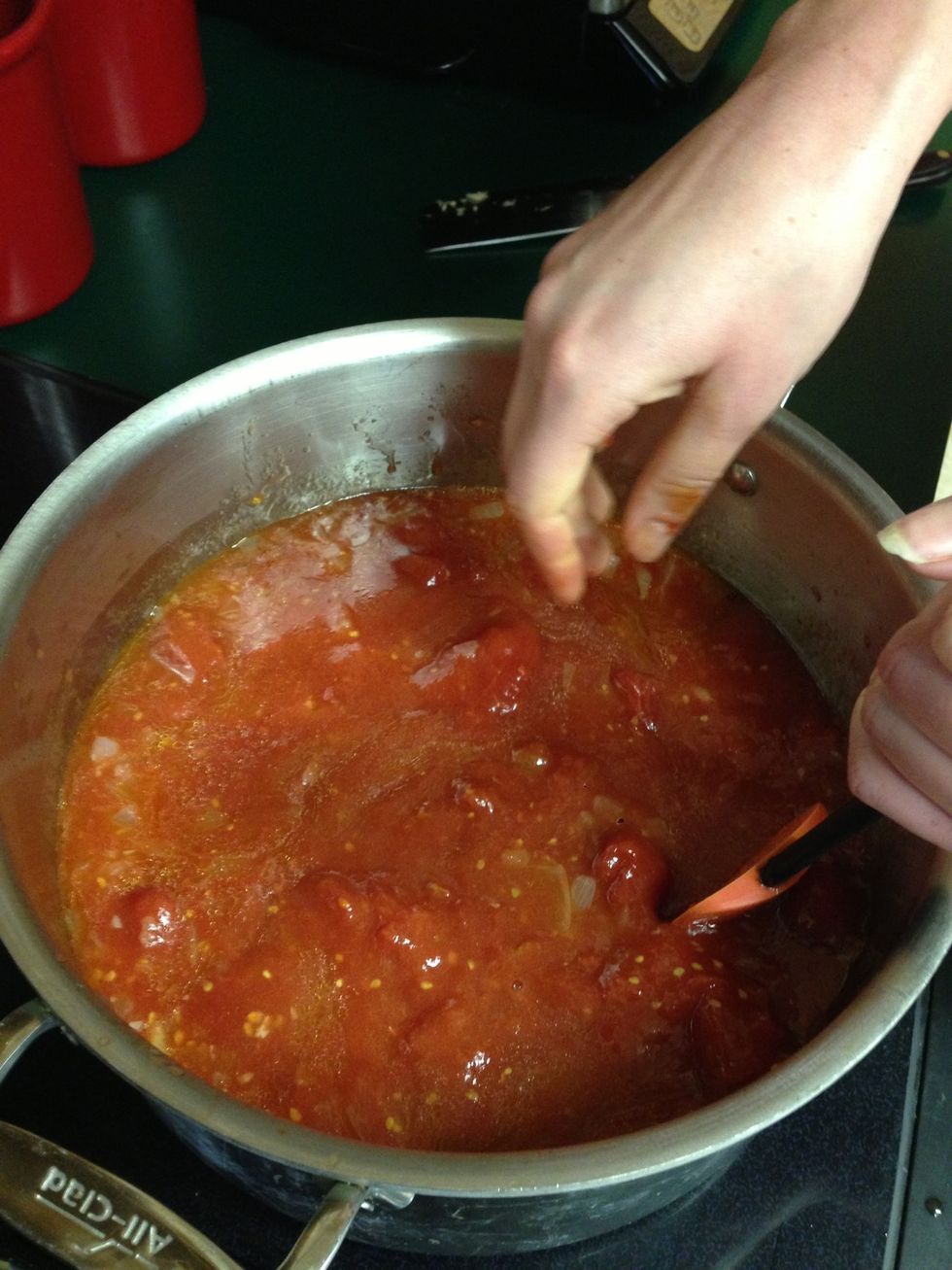 Add the rest of the crushed tomatoes