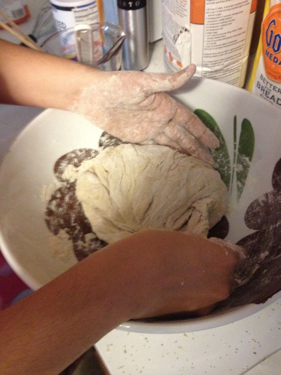 Add the rest of the flour and work the dough.