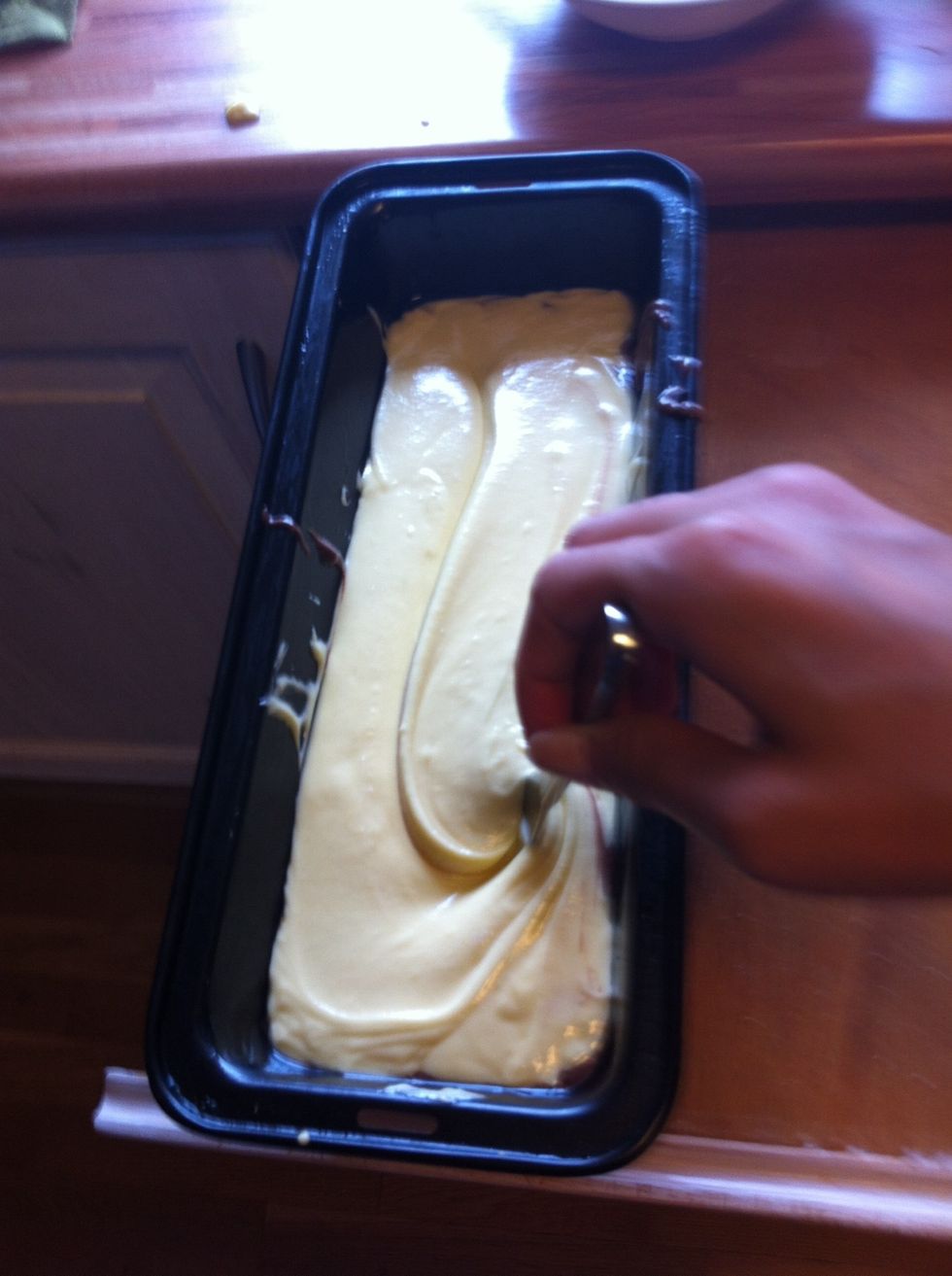 Add the rest of the light batter and drag a fork through the dough