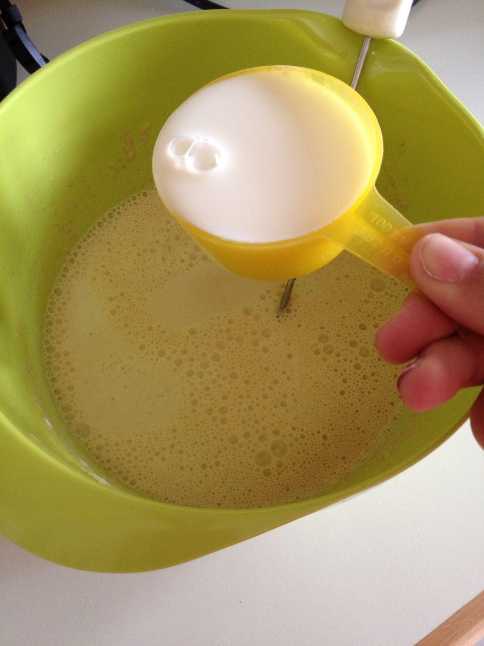 Add the rest of the milk. Whisk
