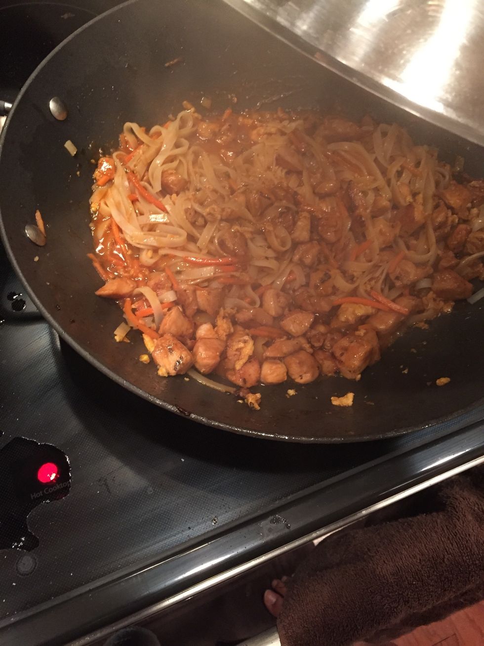 Add the rest of the Pad Thai sauce and cover for 2 minutes so the noodles can get cooked fully.