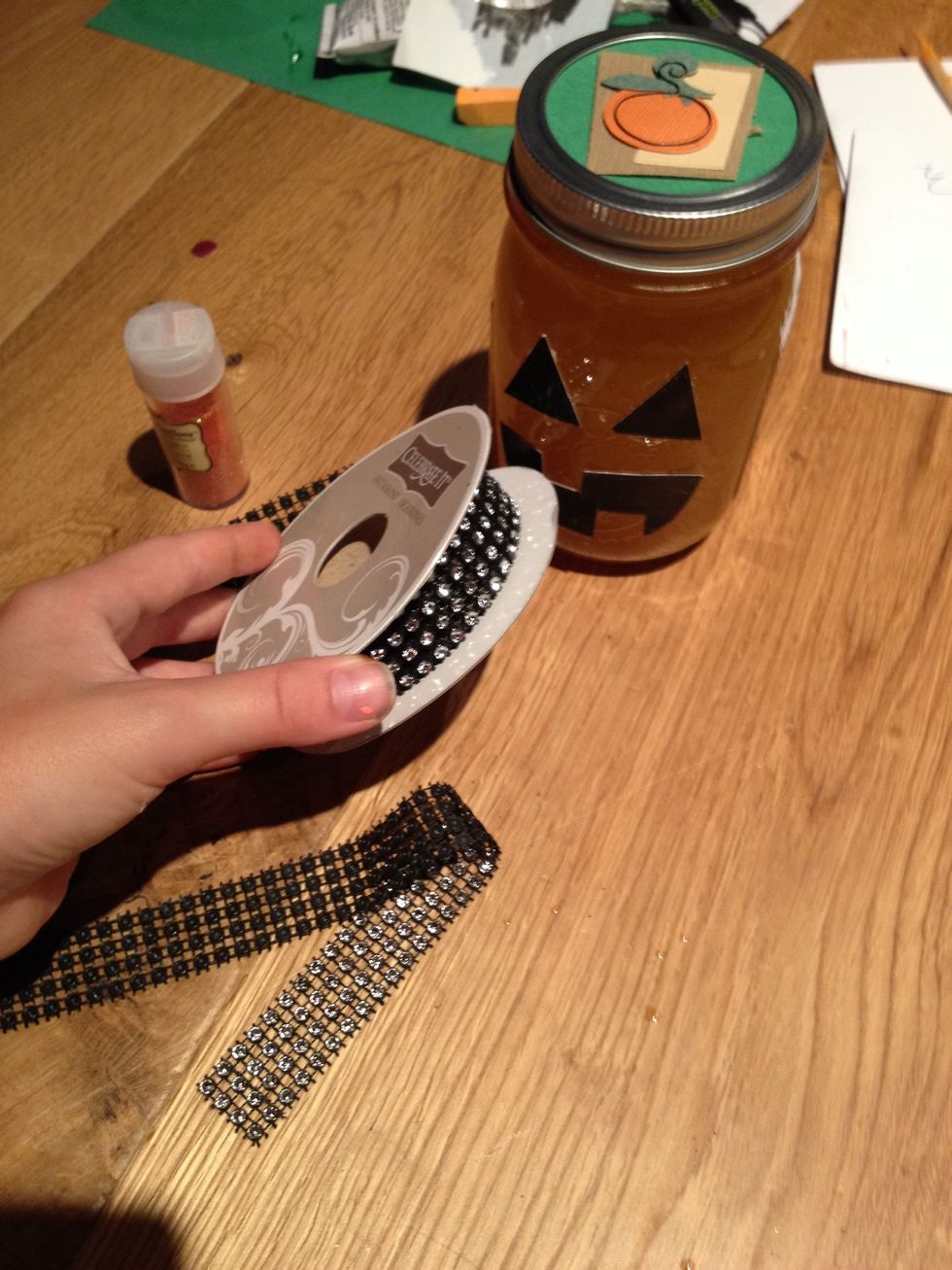 Add the ribbon around the jar (optional)