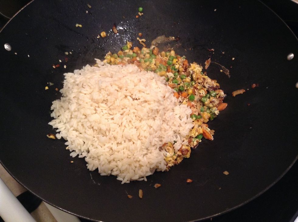 Add the rice and mix together thoroughly. This is when it starts to look appetizing!