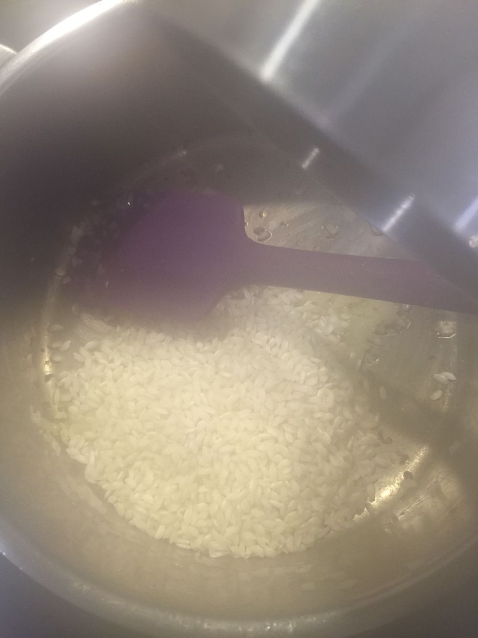 Add the rice. Cook until transparent 3 mins