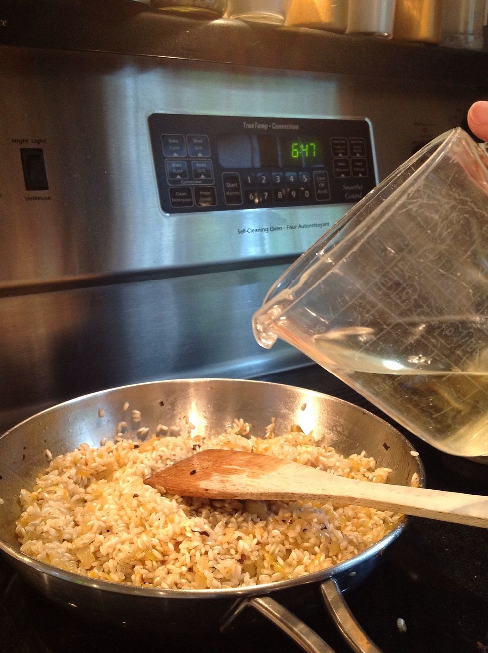 Add the rice to onions and cook for 2-3 minutes. Add a little more Becel if it starts to stick.
