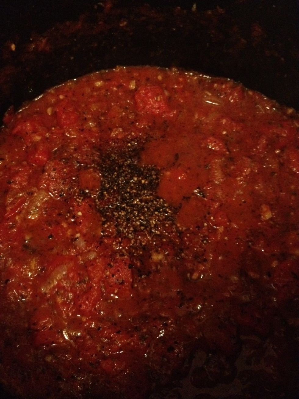 Add the salt, black pepper and sugar. The sugar is meant to help counter the acidity in the tomato.   Let it simmer for 20 mins on a low heat once the sauce reaches boiling point.