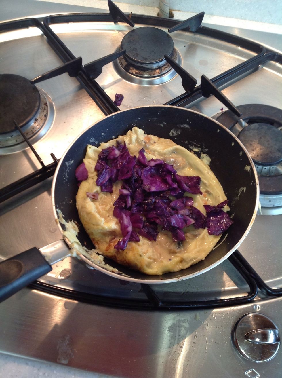 Add the saut\u00e9ed cabbage.