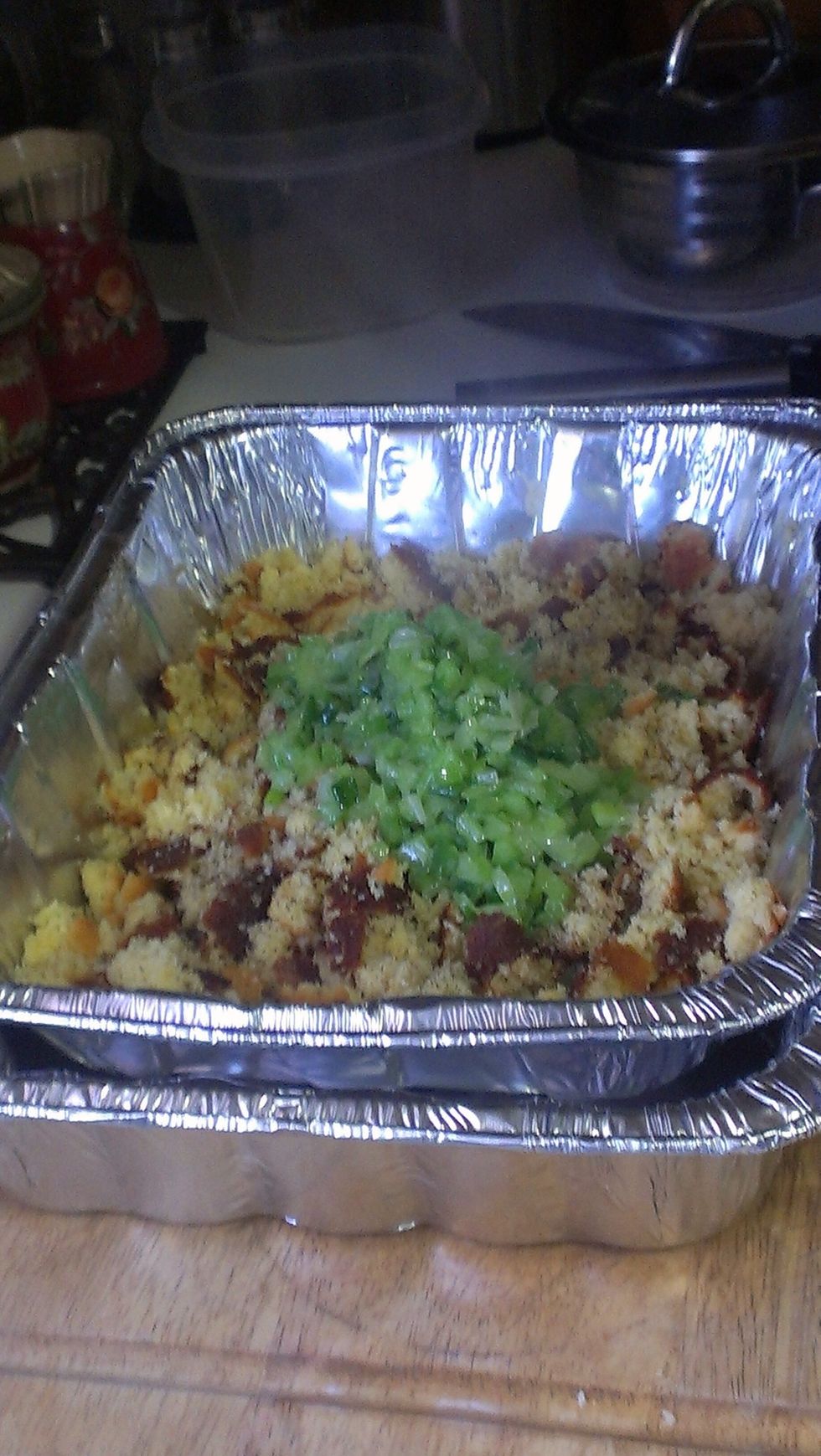 Add the saut\u00e9ed greens to the cornbread mixture