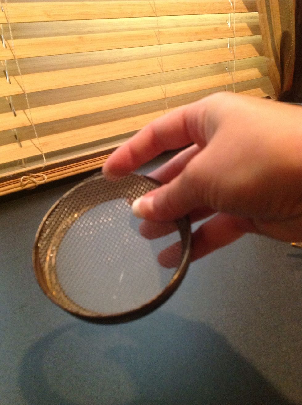 Add the screen back into the ring over the glue & use the end of something besides your finger to press it into place. I'm not taking the blame for your new finger bandage that matches your eye patch.