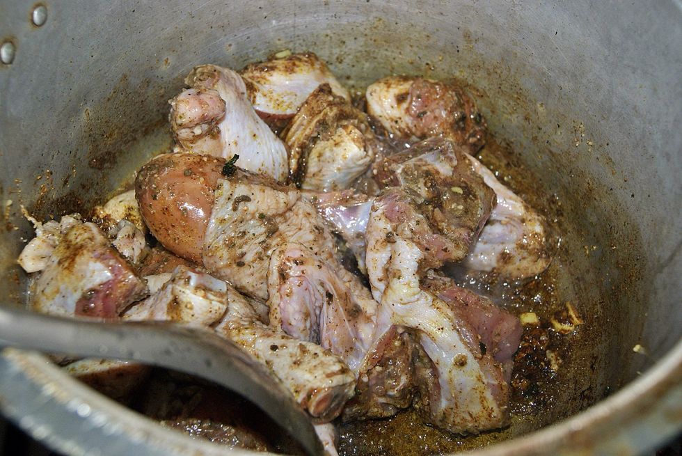 Add the seasoned chicken. If it doesn't go "shhhhhhwaaah" something is wrong.